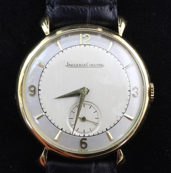 A gentlemans 1950s 18ct gold Jaeger LeCoultre manual wind wrist watch,